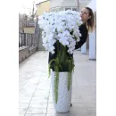 Напольная композиция из силиконовых орхидей в бетонном кашпо