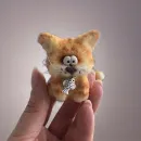 Вязаная интерьерная игрушка: Котик