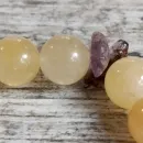 Браслет из кальцита с аметрином