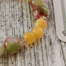 БРАСЛЕТ ИЗ ТУРМАЛИНА С КАЛЬЦИТОМ И КОРАЛЛОМ Браслет из турмалина с кальцитом и кораллом