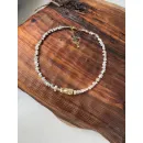 Чокер из серебряного гематита неправильной формы, с крупной золотой бусиной из мятого металла