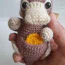 Вязаная игрушка Нюхлер