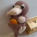 Вязаная игрушка Нюхлер