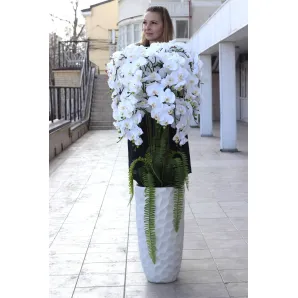 Напольная композиция из силиконовых орхидей в бетонном кашпо