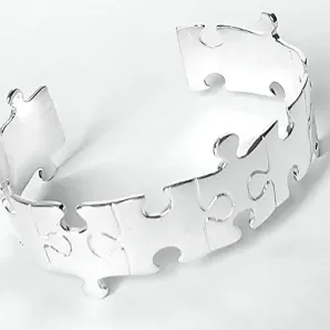 Браслет - кафф жесткий из серебра "Пазлы"