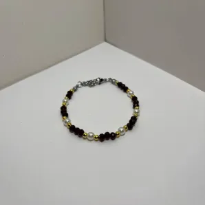 Браслет из бусин рондель ручной работы (бордовый)