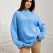 Свитер голубой букле
