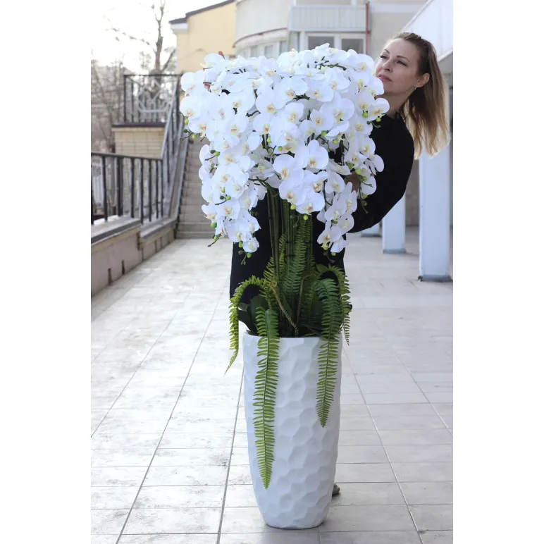 Напольная композиция из силиконовых орхидей в бетонном кашпо