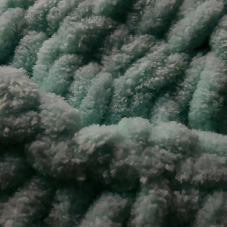 Шапка зеленая вязаная на спицах