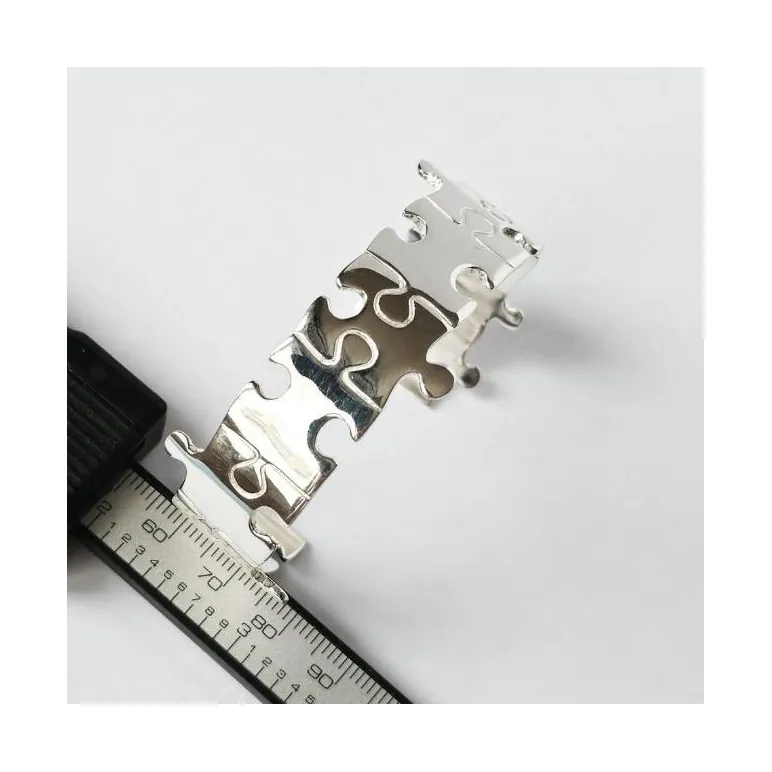 Браслет - кафф жесткий из серебра "Пазлы"