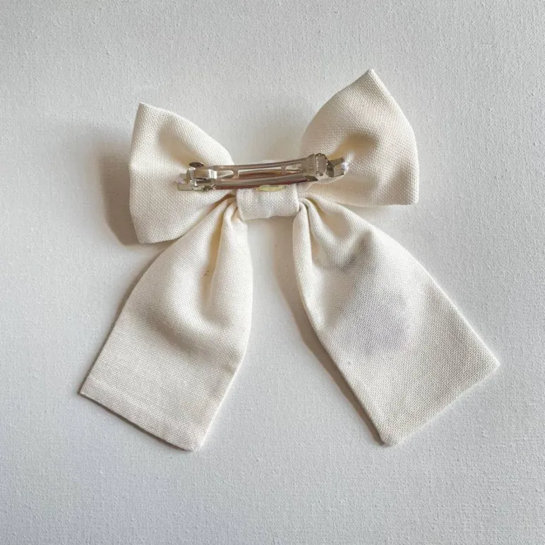 БАНТИКИ РУЧНОЙ РАБОТЫ ИЗ ЛЬНА С ВЫШИВКОЙ Бантики ручной работы из льна с вышивкой