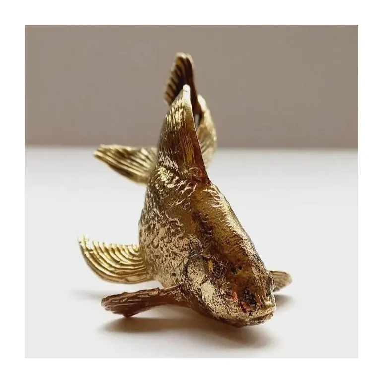 Бронзовая статуэтка золотая рыбка.