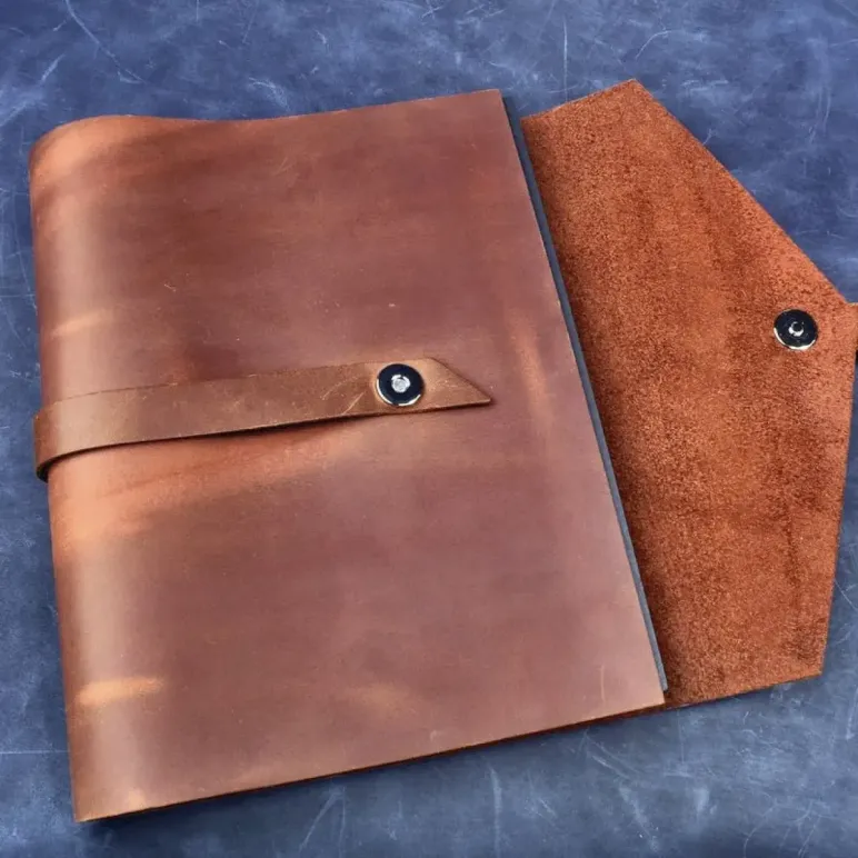 Блокнот из натуральной кожи А5 на кольцах с кнопкой на хлястике