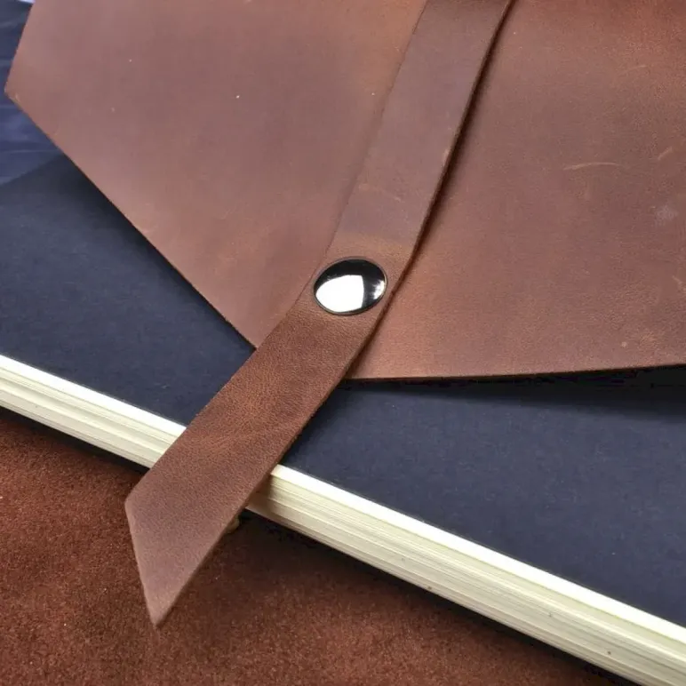 Блокнот из натуральной кожи А5 на кольцах с кнопкой на хлястике