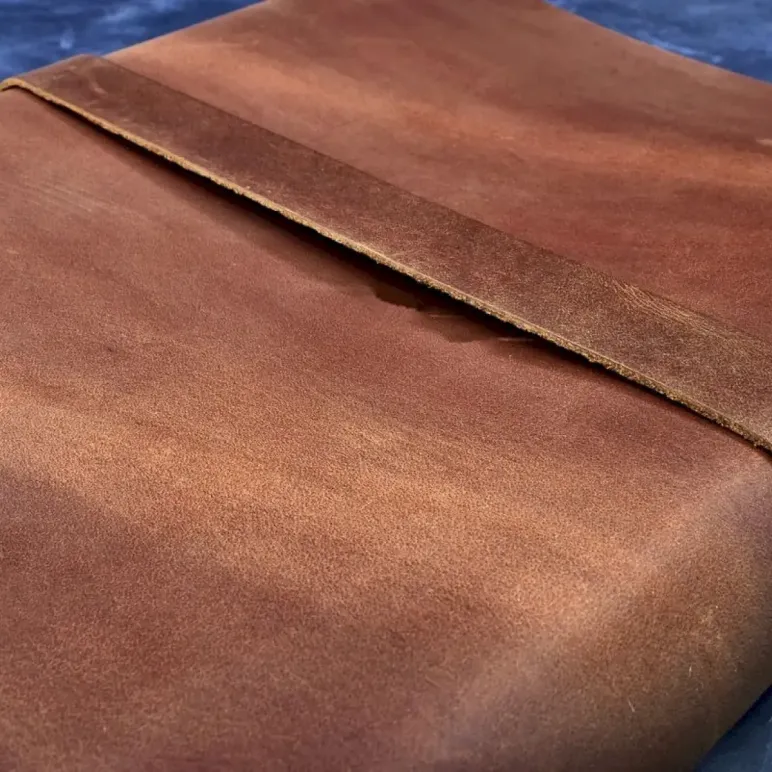 Блокнот из натуральной кожи А5 на кольцах с кнопкой на хлястике