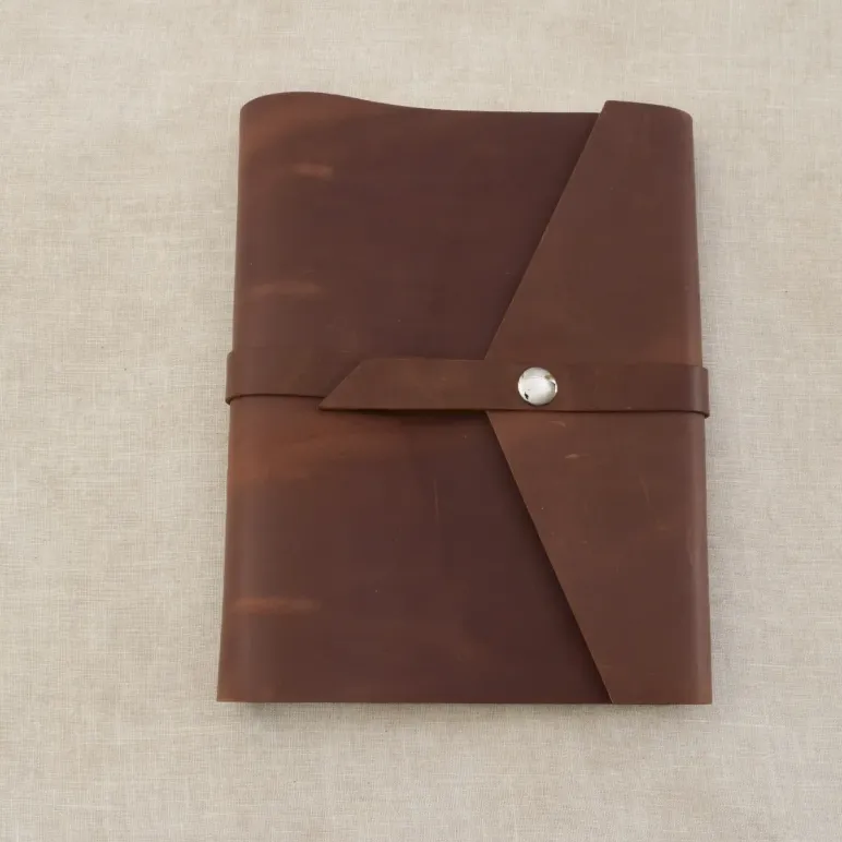 Блокнот из натуральной кожи А5 на кольцах с кнопкой на хлястике