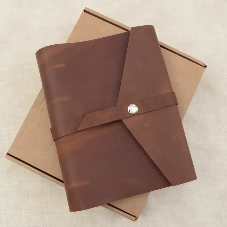 Блокнот из натуральной кожи А5 на кольцах с кнопкой на хлястике