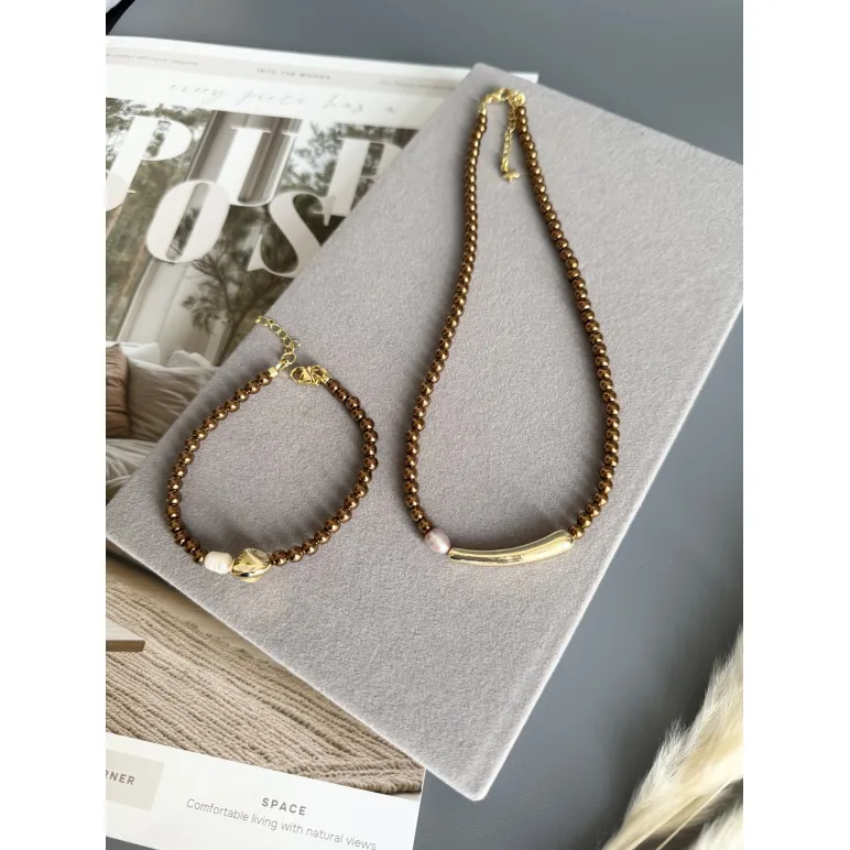 Чокер из и жемчуга майорка цвета шоколад, золотой металлической вставкой и розовой жемчужиной