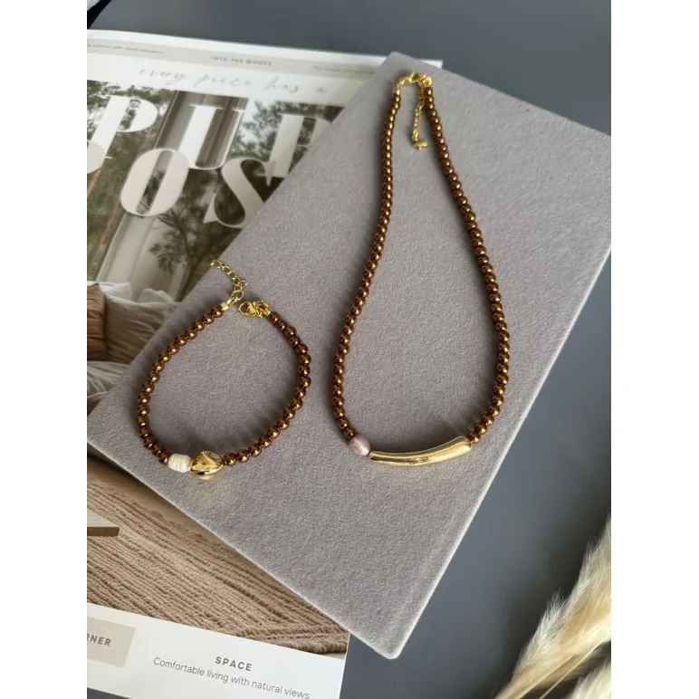 Чокер из и жемчуга майорка цвета шоколад, золотой металлической вставкой и розовой жемчужиной