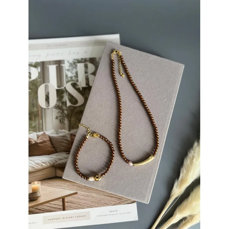 Чокер из и жемчуга майорка цвета шоколад, золотой металлической вставкой и розовой жемчужиной